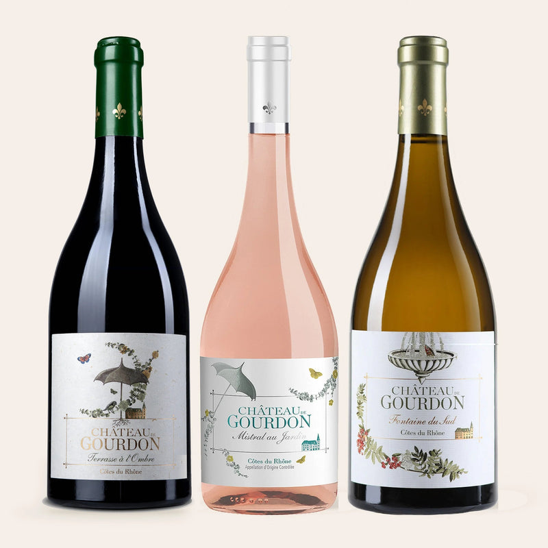 The French Trio: Terrasse à l'Ombre red, Mistral au Jardin rosé and Fontaine du Sud white, three bottles on a cream ground
