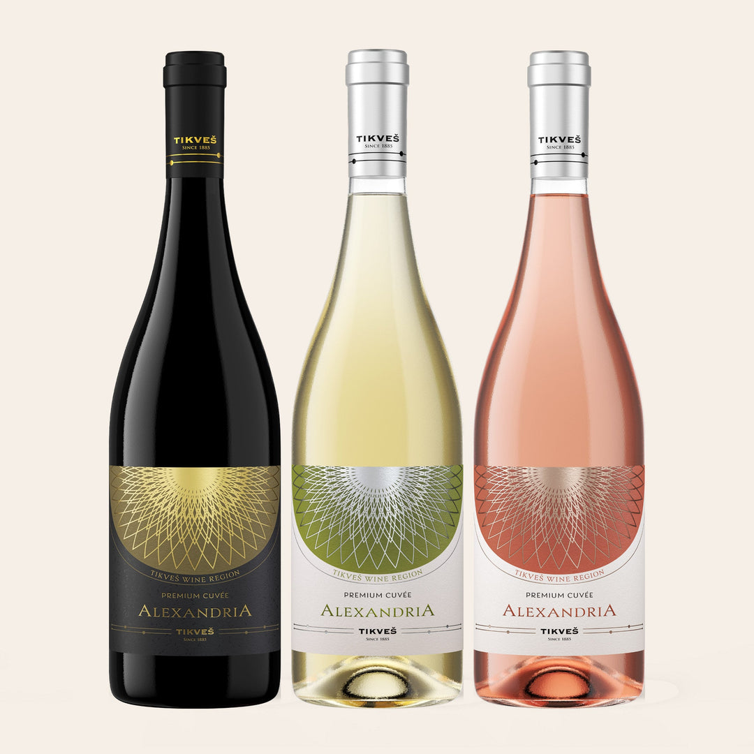 The Alexandria: Premium Cuvée red, white and rosé, three bottles on a cream ground