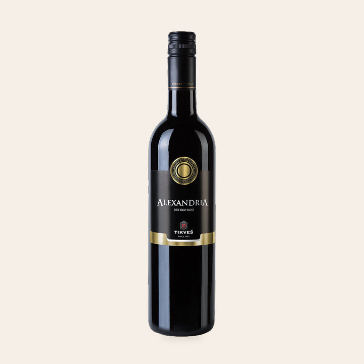 Bottle of Alexandria Classic Red, a dry red wine from Tikveš, on a cream background