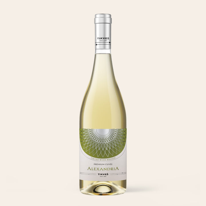 Bottle of Tikveš Alexandria Premium Cuvée White, a Chardonnay and Riesling blend, on a cream background