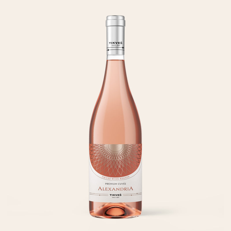 Bottle of Tikveš Alexandria Premium Cuvée Rosé, a dry rosé wine, on a cream background